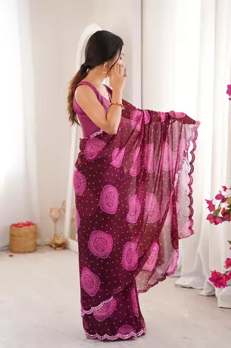  georgette bandhani gola print saree with mirror work & cutwork border