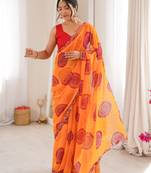 Heavy georgette bandhani gola print saree with mirror work & cutwork border