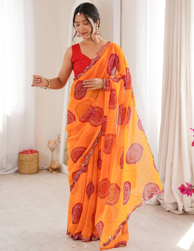 Heavy georgette bandhani gola print saree with mirror work & cutwork border