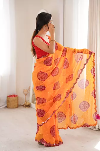  georgette bandhani gola print saree with mirror work & cutwork border