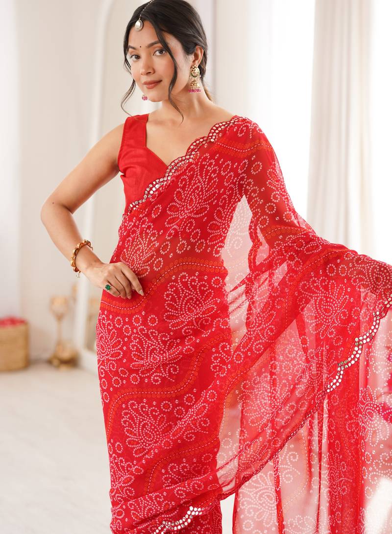 Heavy georgette bandhani print saree with mirror work & cutwork border