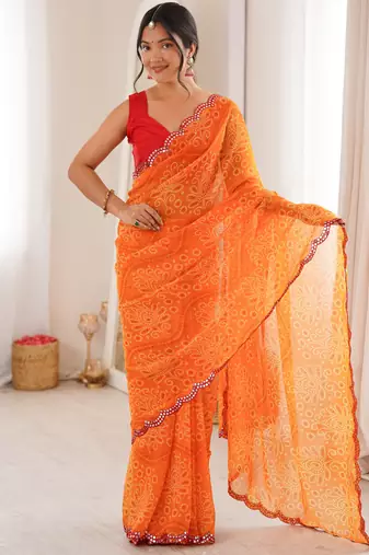 Heavy georgette bandhani print saree with mirror work & cutwork border
