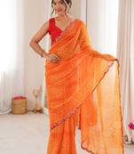 Heavy georgette bandhani print saree with mirror work & cutwork border