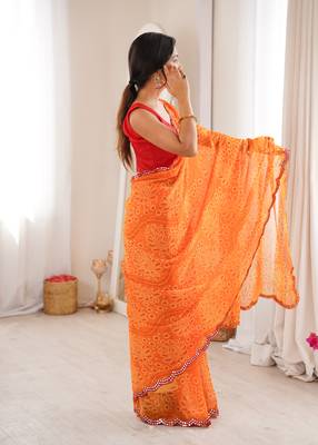  georgette bandhani print saree with mirror work & cutwork border 3