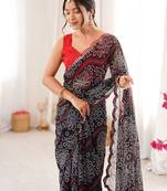Heavy georgette bandhani print saree with mirror work & cutwork border
