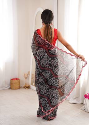  georgette bandhani print saree with mirror work & cutwork border 2