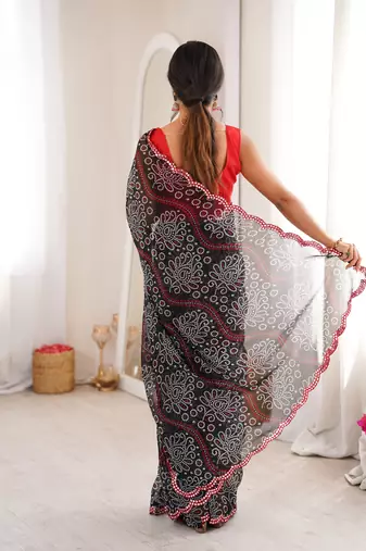  georgette bandhani print saree with mirror work & cutwork border
