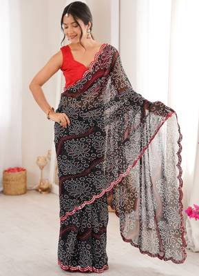  georgette bandhani print saree with mirror work & cutwork border 4