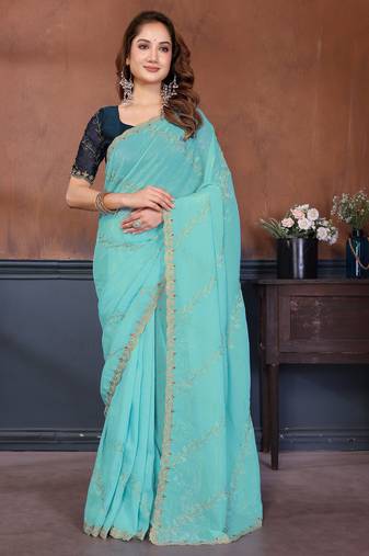 Blue crunchy cruss silk embroiderd saree with contrast blouse piece