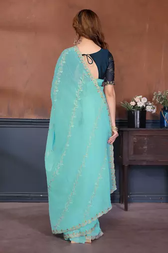 Blue crunchy cruss silk embroiderd saree with contrast blouse piece