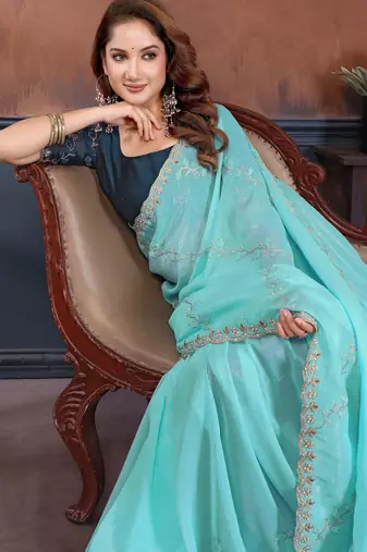 Blue crunchy cruss silk embroiderd saree with contrast blouse piece