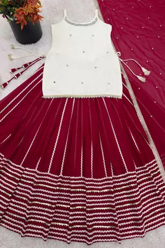 Off white silk blend embroidered  lehenga kurti with real mirror work set
