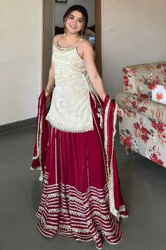 Off white silk blend embroidered  lehenga kurti with real mirror work set