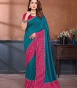 Teal vichitra silk bandhani patta stone work saree with contrast blouse piece