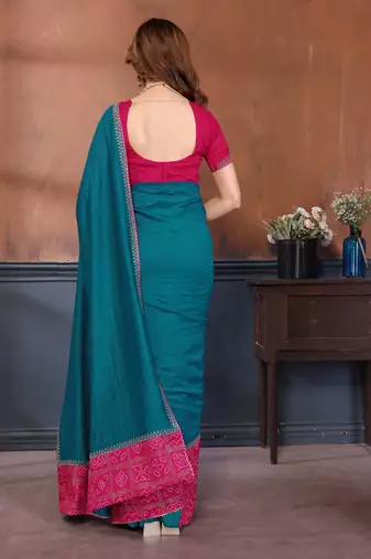 Teal vichitra silk bandhani patta stone work saree with contrast blouse piece