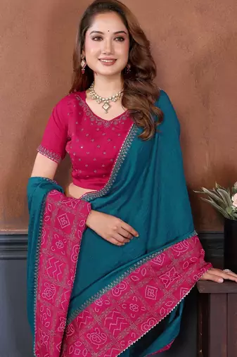 Teal vichitra silk bandhani patta stone work saree with contrast blouse piece