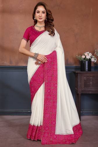 White vichitra silk bandhani patta stone work saree with contrast blouse piece