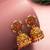 Aadita Traditional Gold-Tone Kundan Jhumka Earrings with Pink and Green Stones