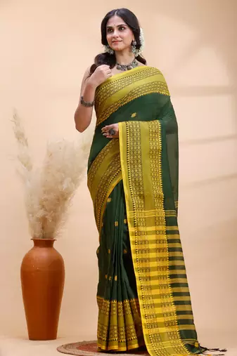 Dark green handloom cotton saree with yellow traditional border & intricate weaving design