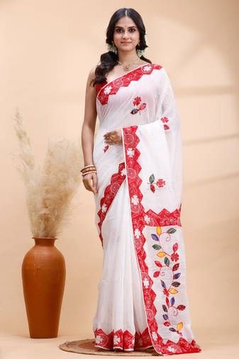 White & red handloom saree with intricate applique work and floral artistic border