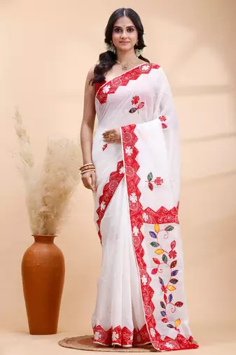 White & red handloom saree with intricate applique work and floral artistic border