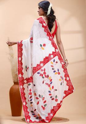 White & red handloom saree with intricate applique work and floral artistic border 3