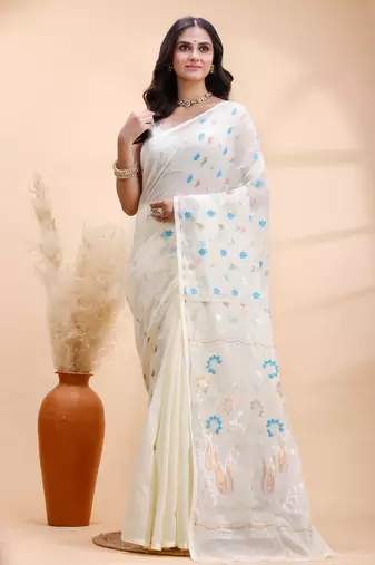 Ivory handloom cotton saree with delicate blue and golden floral buti and artistic woven pallu