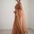 Peach net embellished saree with contrast blouse piece