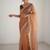 Peach net embellished saree with contrast blouse piece