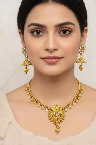 Gold plated kundan necklace set with earrings for women