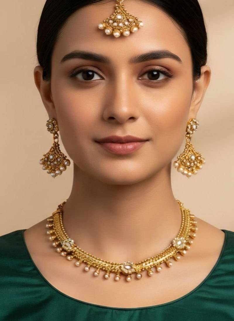 Gold plated kundan pearl choker necklace set with earrings & maang tikka for women