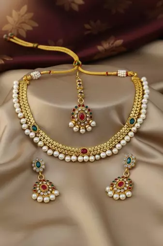 Designer gold plated kundan pearl bridal choker set with earrings & tikka