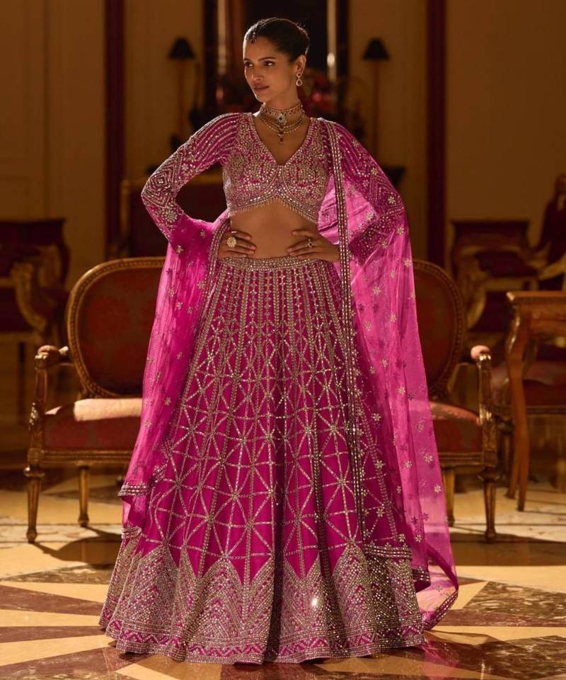 rani pink art silk embroidered lehengas