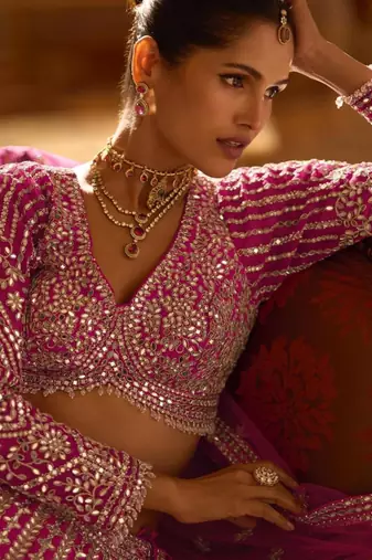 rani pink art silk embroidered lehengas
