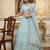 light sea green net hand woven lehengas