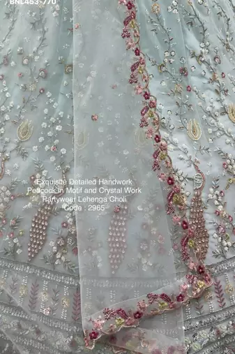 light sea green net hand woven lehengas