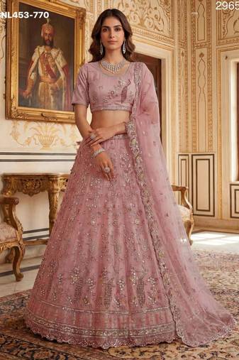 light baby pink net hand woven lehengas