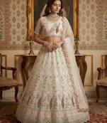 light off white net hand woven lehengas