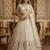 light off white net hand woven lehengas