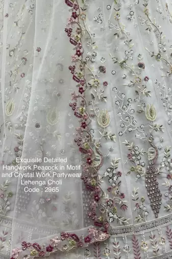 light off white net hand woven lehengas