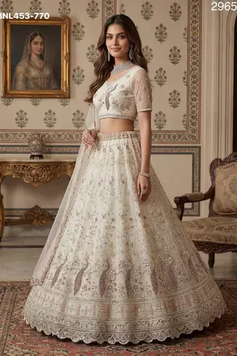 light off white net hand woven lehengas