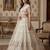 light off white net hand woven lehengas