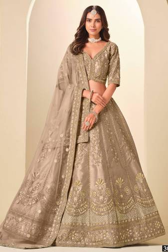 dark beige art silk embroidered lehengas