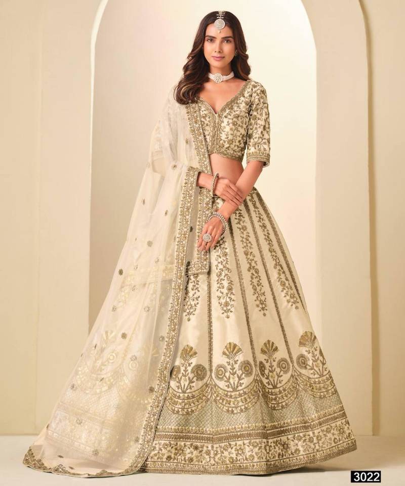 off white art silk embroidered lehengas