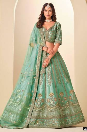 sea green art silk embroidered lehengas