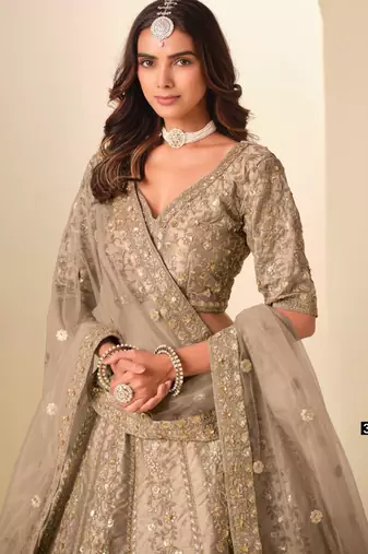 dark beige art silk embroidered lehengas