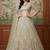 beige net embroidered lehengas