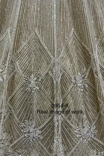beige net embroidered lehengas