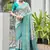 Sea green color banarasi silk ajhrakh meena zari weaving patola saree