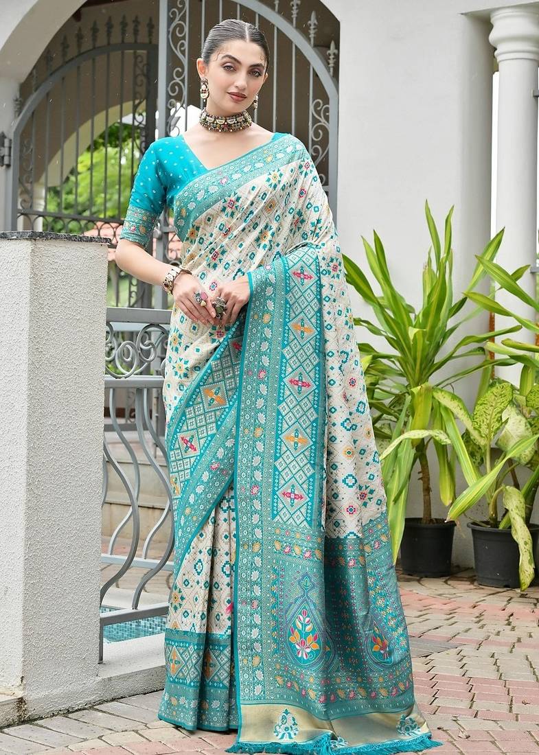 Sea green color banarasi silk ajhrakh meena zari weaving patola saree